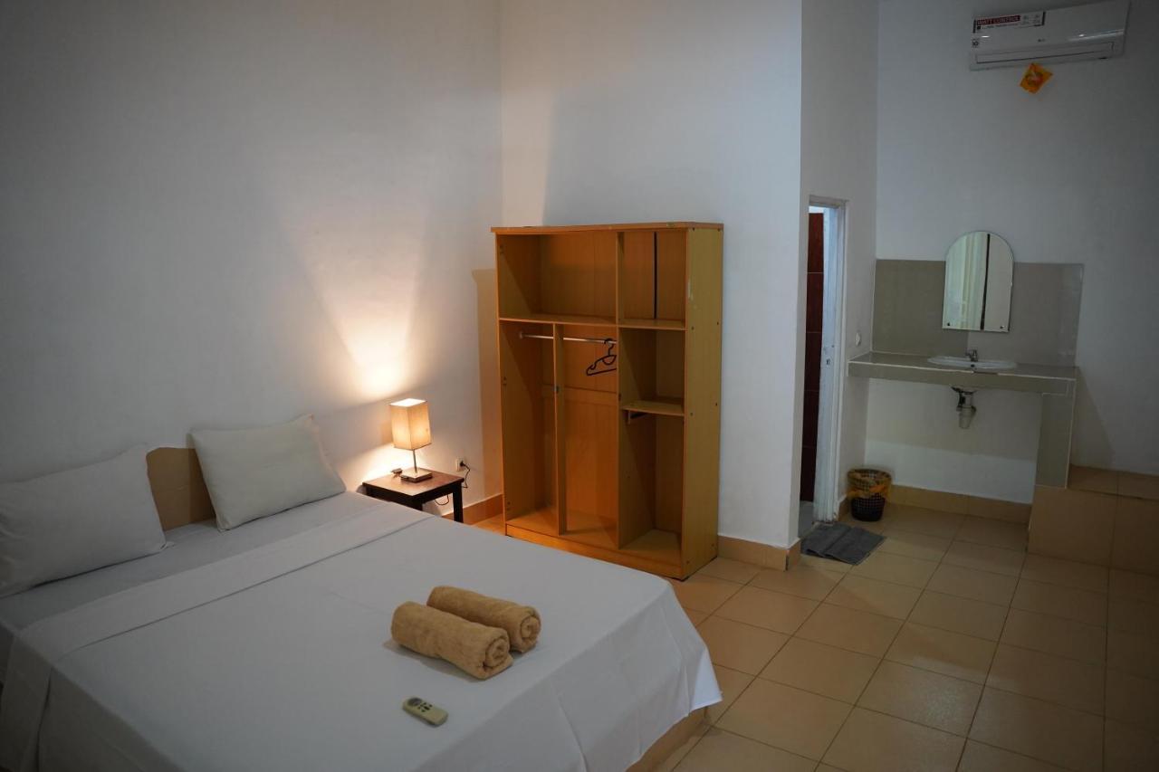 Qurnia Homestay Kuta  Luaran gambar