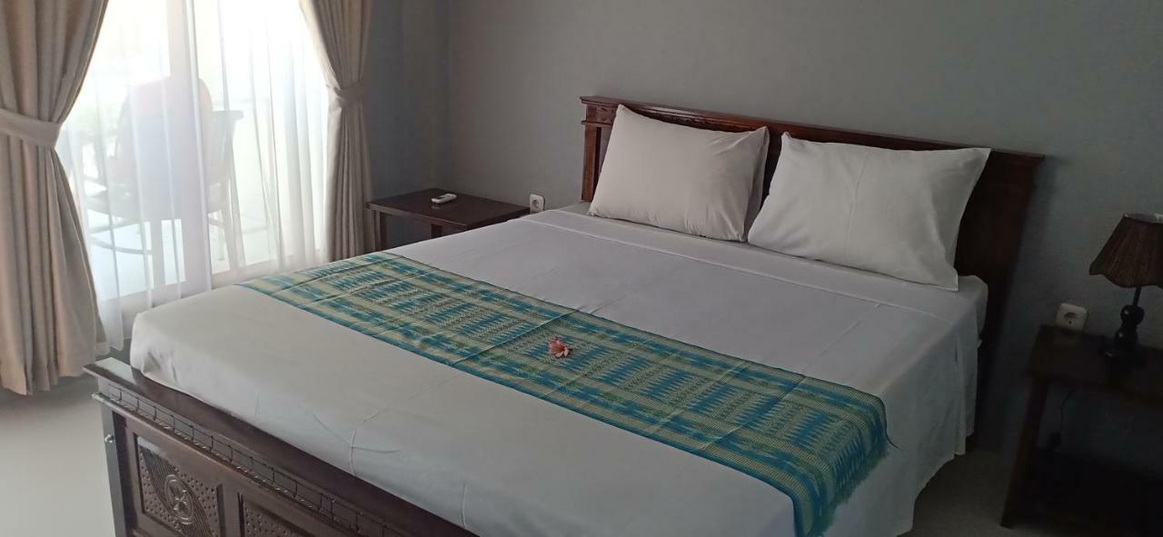 Qurnia Homestay Kuta  Luaran gambar